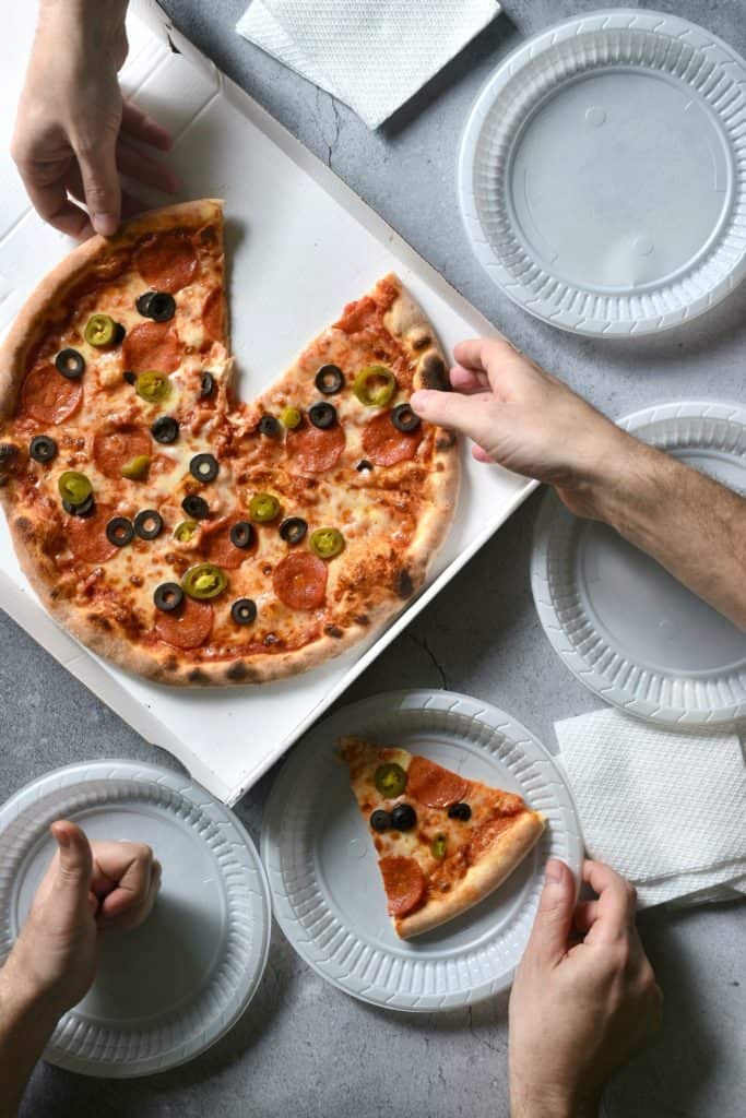 People eating pizza